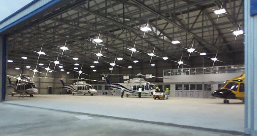 helicopters and airplanes in metal hangar frisomat nal67hg1hysug961k2v0buys0hyv78mf28jlkffr10