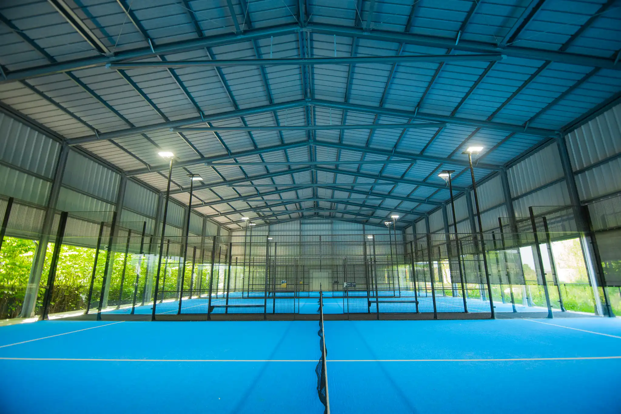 Frisomat industrial buildings steel padel court canopy meadow club 30